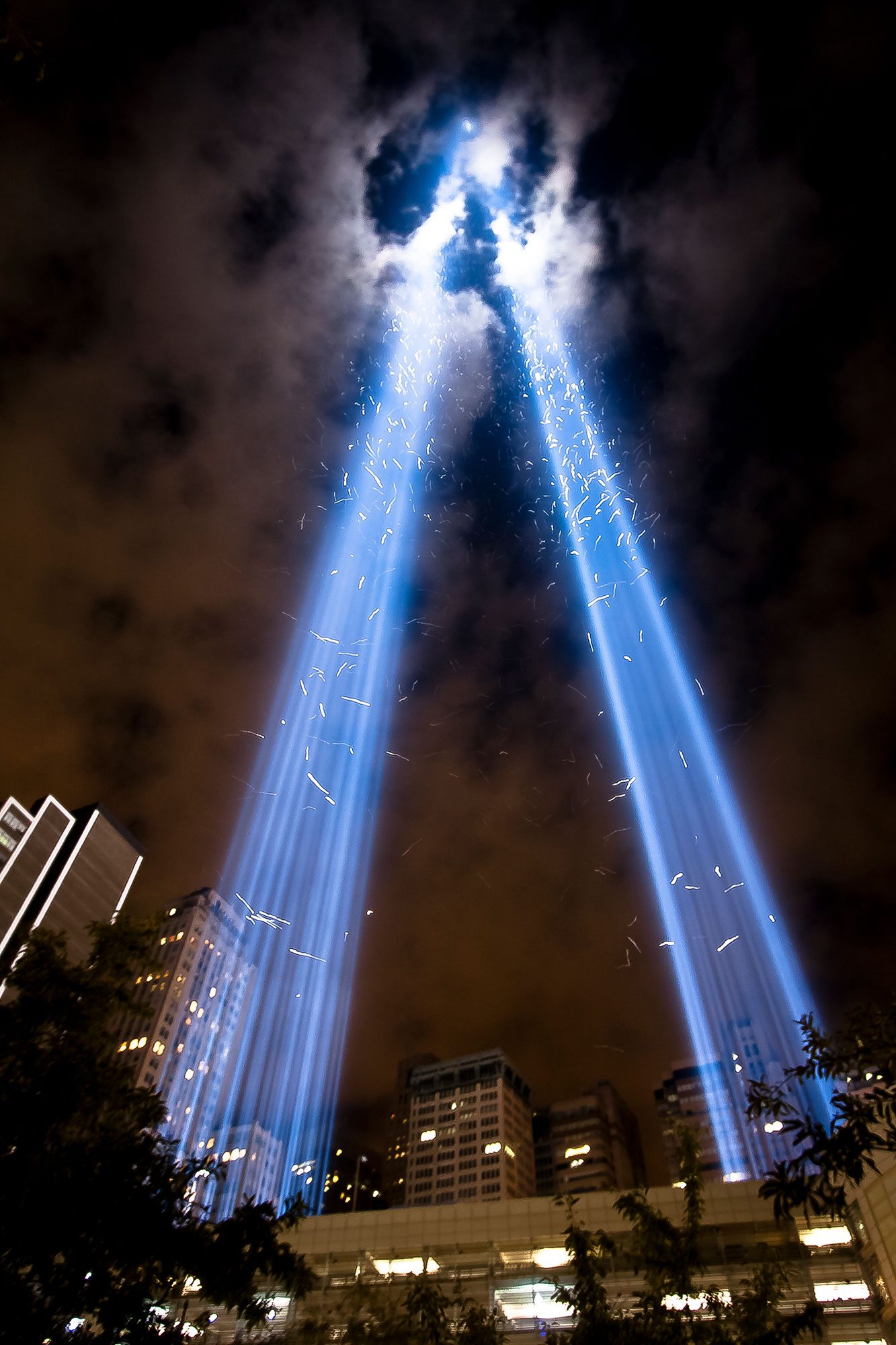 Light beams rising in the sky